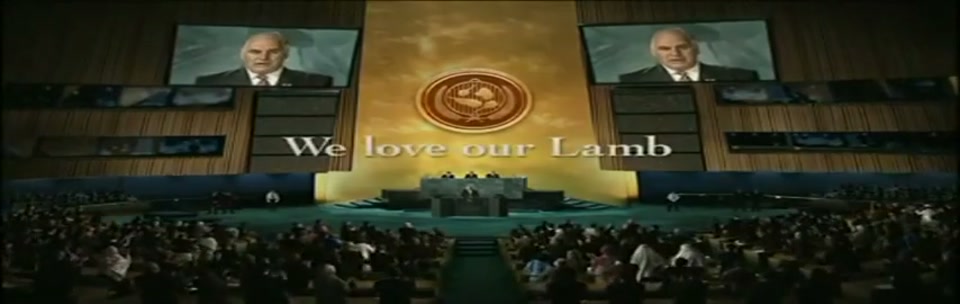 Sam Kekovich UN Speech (2010), scene 6 at 01:30: Kekovich concludes his speech. The screen fades to black with the campaign slogan and his sign-off.