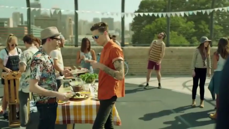 Generation Lamb (2014), scene 3 at 00:32: Kekovich approaches another family: two parents dressed in hippie-style clothing and their young son, who is wearing a singlet that says "Vegan and Proud." The parents are admiring a small potted plant.